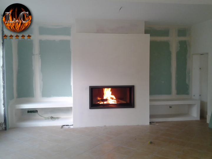 Installation de poêle à bois en fonte